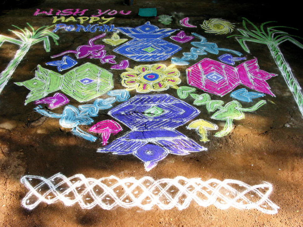 The finished image indicates it is for 'Pongal' The process has similarities to my experiences of making Felt. The reflective symmetry is common in Indian Felt-making. The colour seemingly does not quite follow the same symmetry rules!
The grid of dots and the random forms as choices remind me of aspects of Paul Klee's working processes.